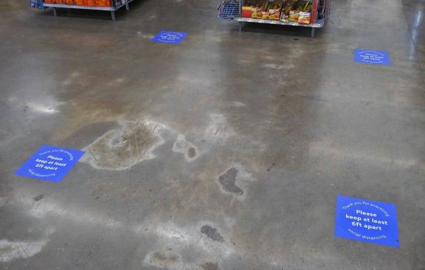Social_distancing_floor_signs_at_Walmart_Newburgh_NY-620x395.jpg